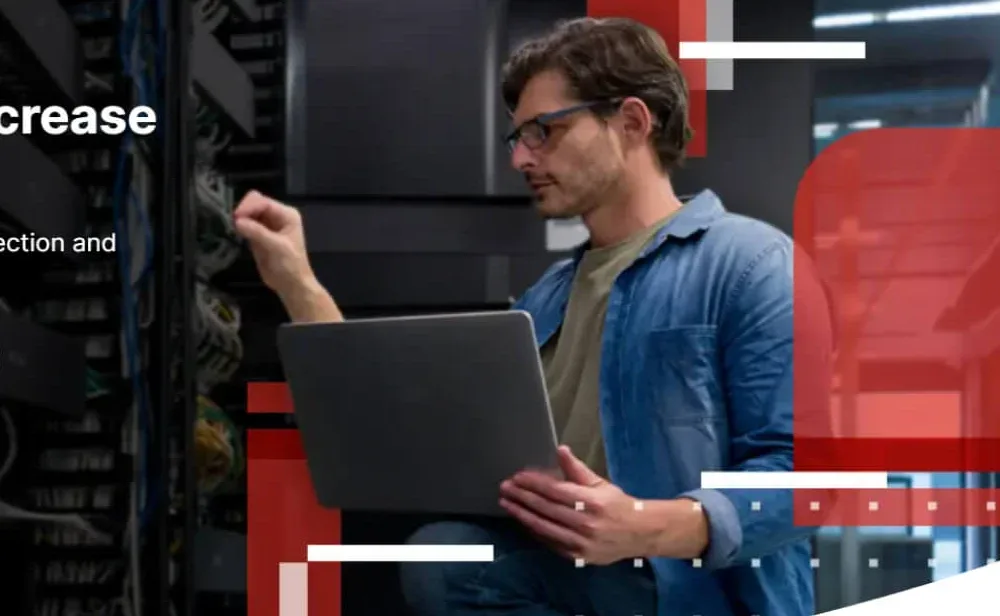 Fortinet hero image of a technician working on a laptop in a server room