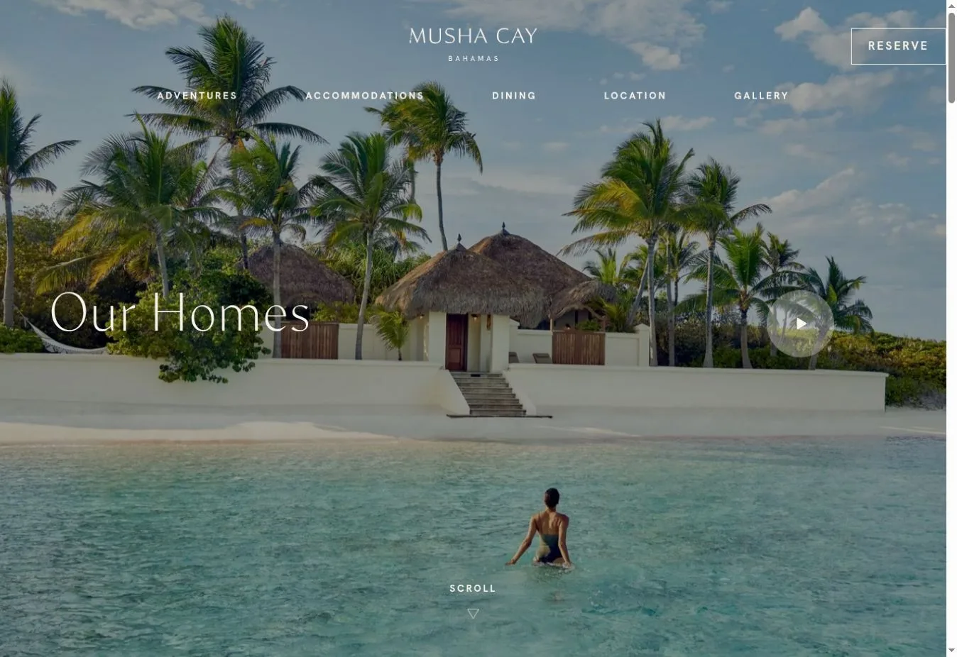 Musha Cay Our Homes section with a beachfront villa and palm trees