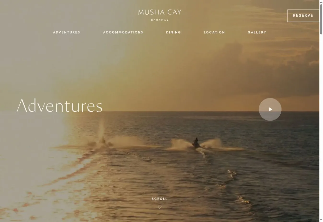 Musha Cay Adventures section with a jet ski at sunset